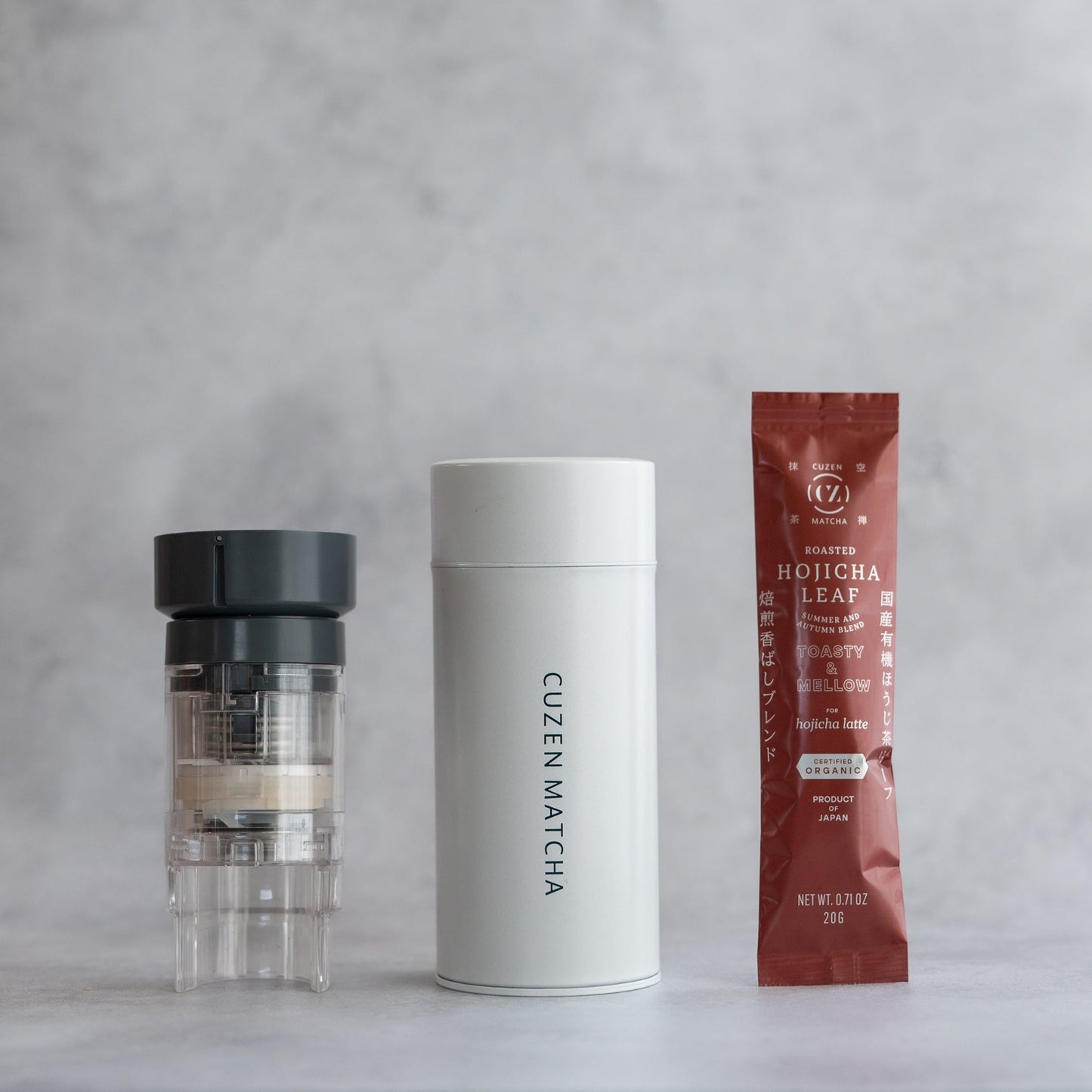 Hojicha Starter Kit: A Ceramic Mill Unit, a Mill Unit Case, and a 20-gram packet of Organic Hojicha Leaf.