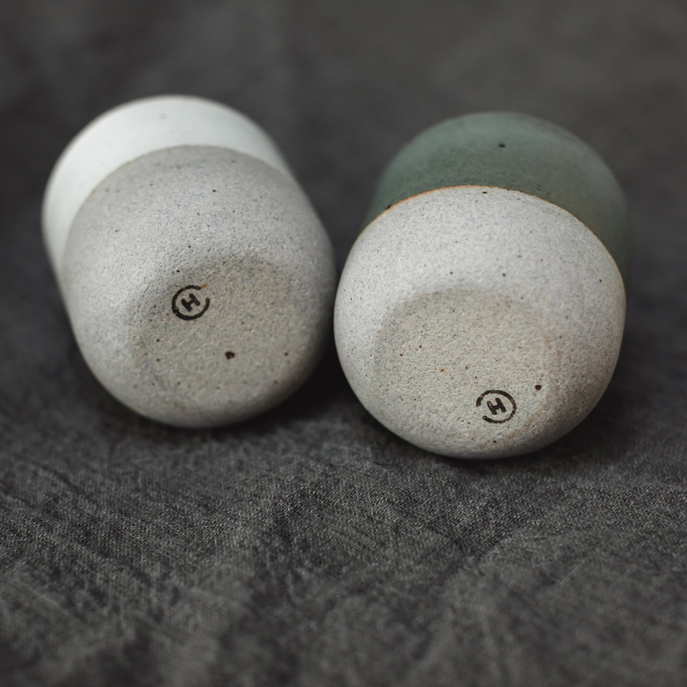 The bottom of two Perfect Matcha Latte Cups, displaying the Humble Ceramics stamp that indicates their pottery of origin.