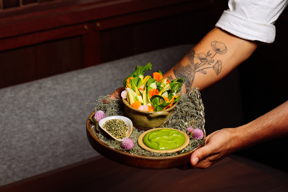 A plate of spring vegetables, matcha mayonnaise and tencha goma shio.