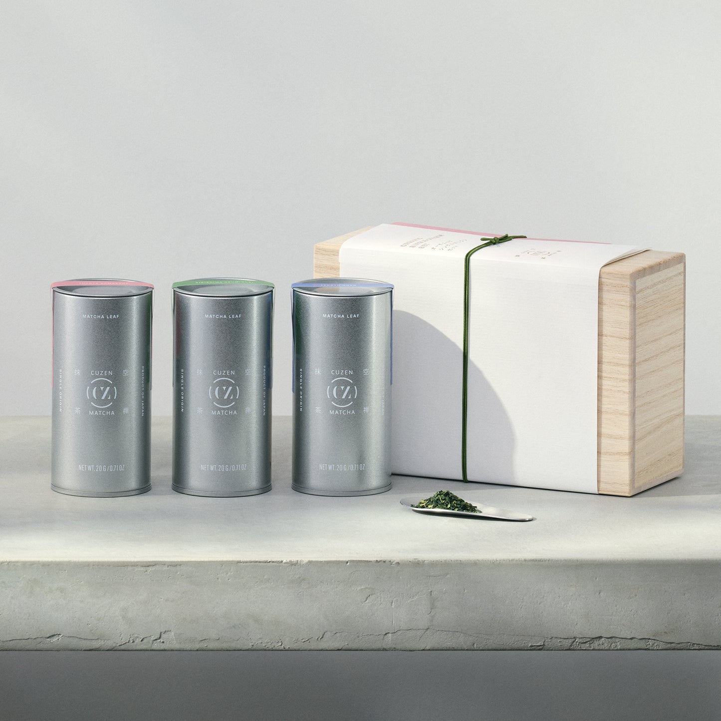 Single Origin Matcha Box Set: 3 Single Origin canisters displayed in front of the kiri bako.