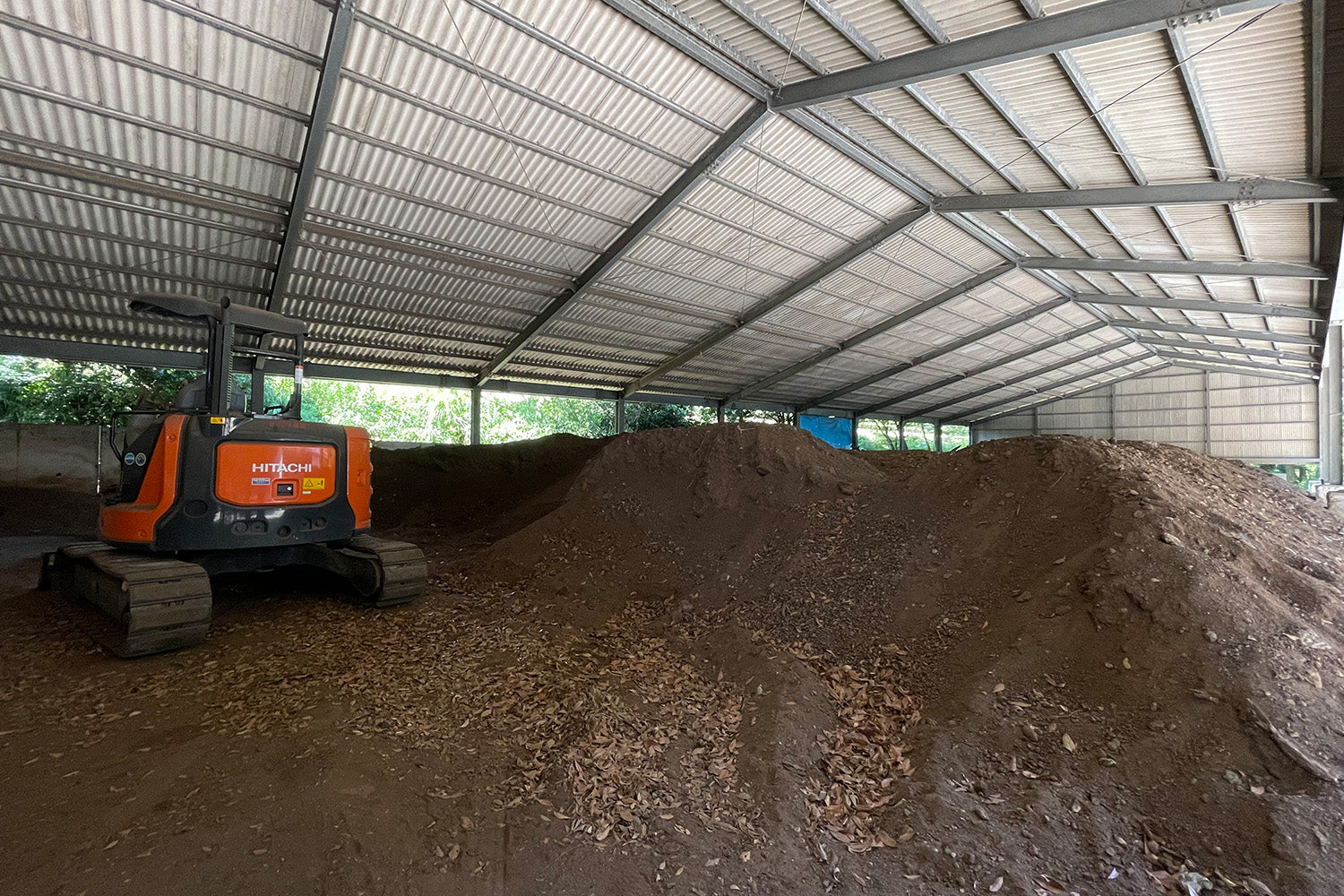 A huge pile of organic compost, which will be used to feed tea plants on the Kagoshima farm.