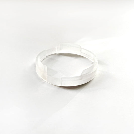 The upper spatula is a part of the Cuzen Matcha Maker’s ceramic mill unit.