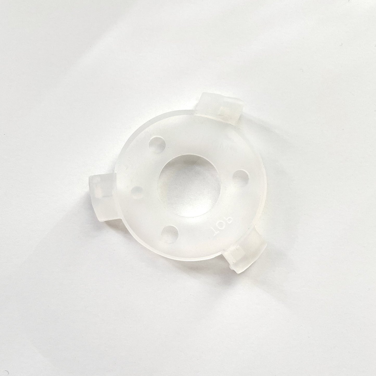 The lower spatula is a part of the Cuzen Matcha Maker’s ceramic mill unit.