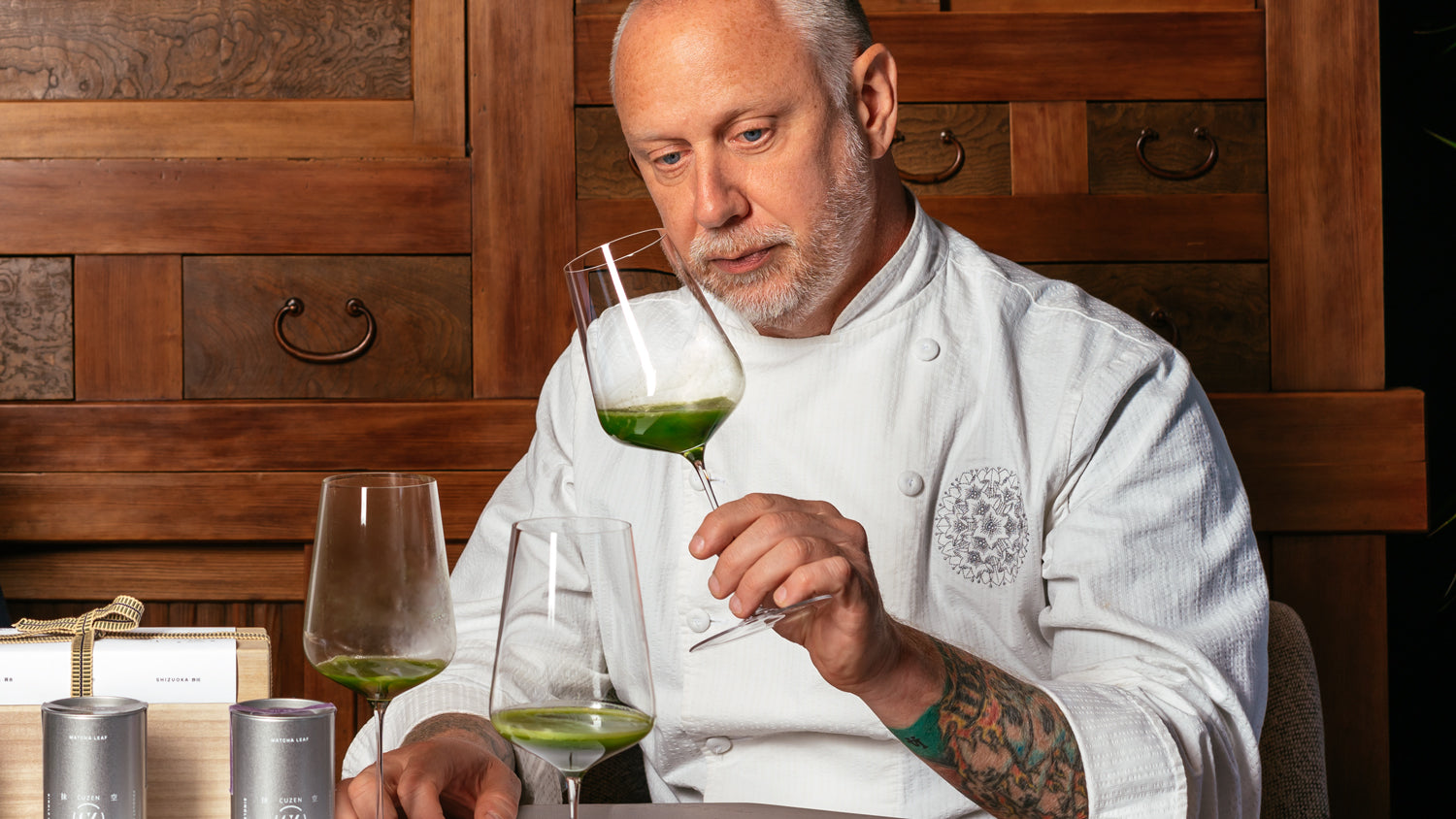 SingleThread chef Kyle Connaughton swirls a wine glass of fresh matcha during a tasting of Cuzen Matcha.