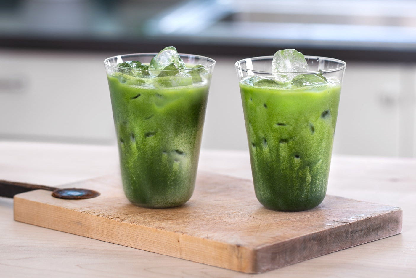 Two Perfect Matcha Latte Glasses display a beautiful show of green colors through the crystal-clear, paper thin glass.