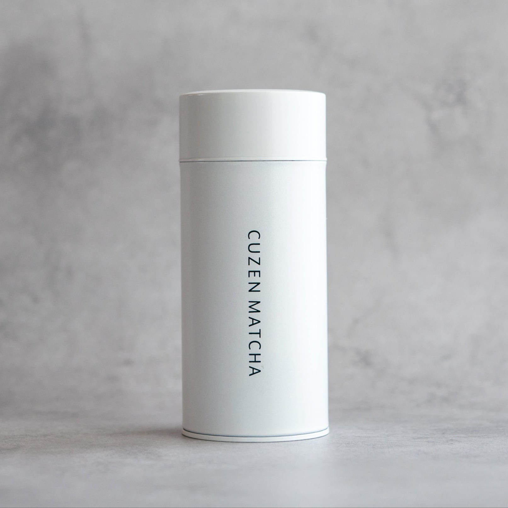 The white Cuzen Mill Unit Case for storing the Matcha Maker Ceramic Mill Unit.