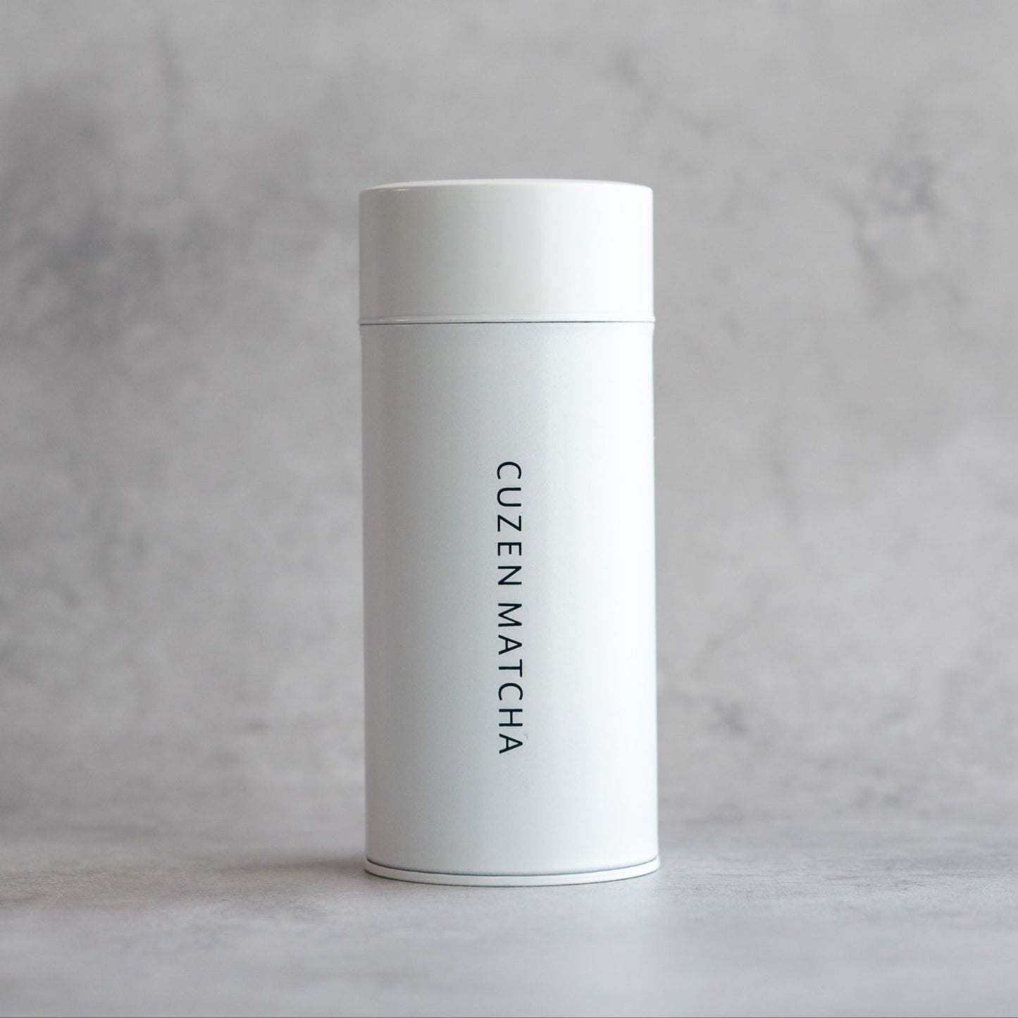 The white Cuzen Mill Unit Case for storing the Matcha Maker Ceramic Mill Unit.